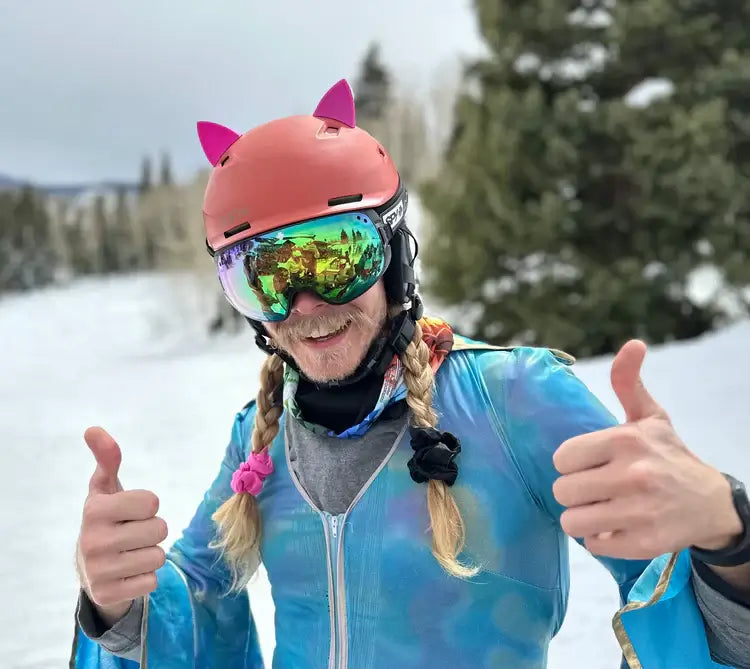 helmet flair cat ears being modeled by a person with a pink helmet and pony tails