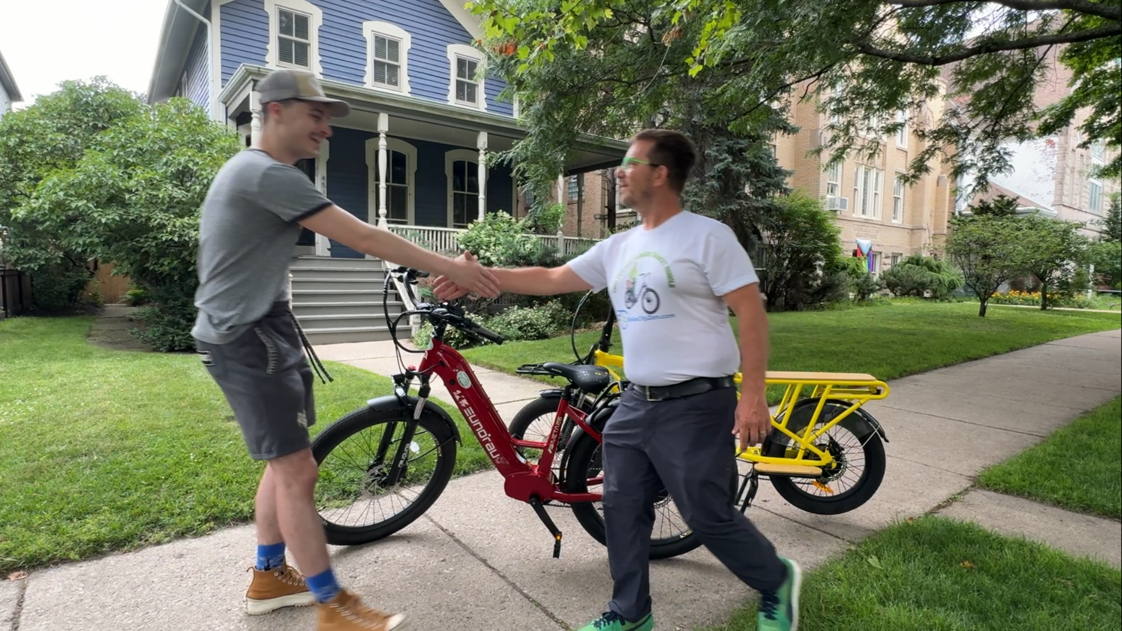 EbikeCityZen owner Joe Borrelli demonstrating Ebikes to a potential customer.