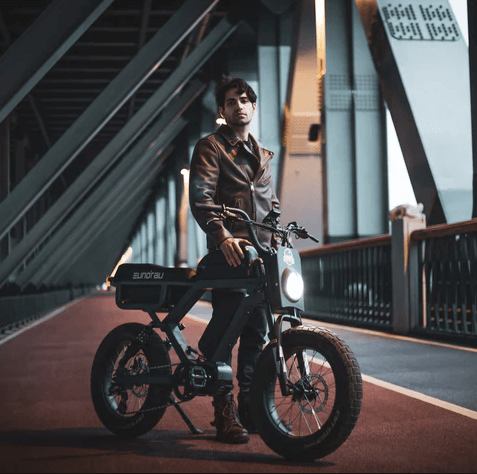 Cruiser ebike collection image showing a man in a leather jacket with the Eunorau Flash Ebike