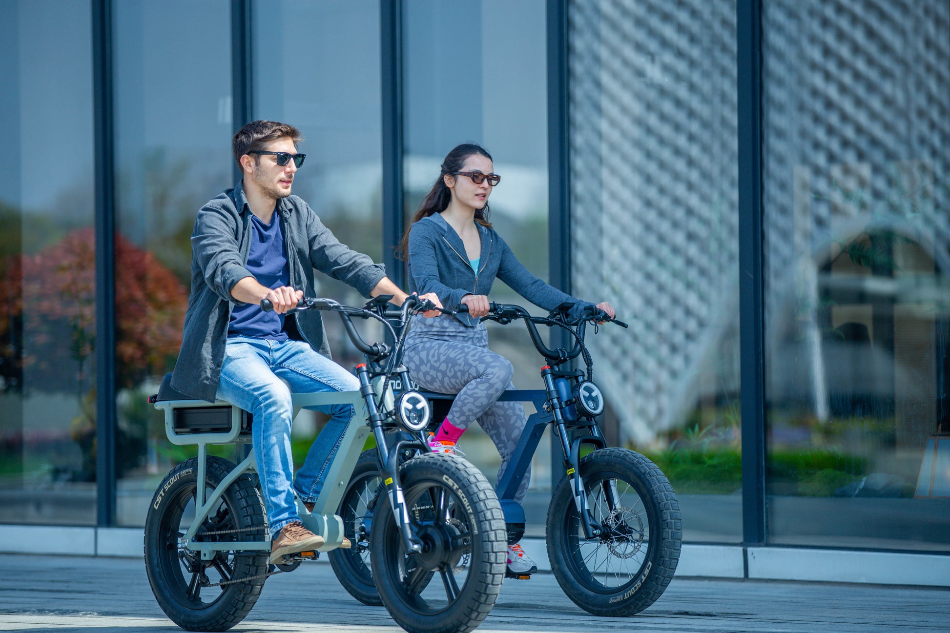 EUNORAU FLASH stylish ebike available in mid drive rear hub drive and all wheel drive couple riding together