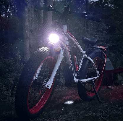 SENADA ARCHON PLUS 1000W fat tire electric bike with front light on in dark forest