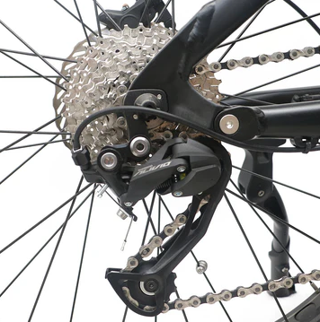 Close-up of EUNORAU FAT-HS Ebike 9-speed shimano altus/sunrace RDM91 rear derailleur and gear system.