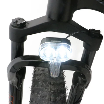 Dual suspension front wheel and bright headlight of the EUNORAU FAT-HS fat tire Ebike.